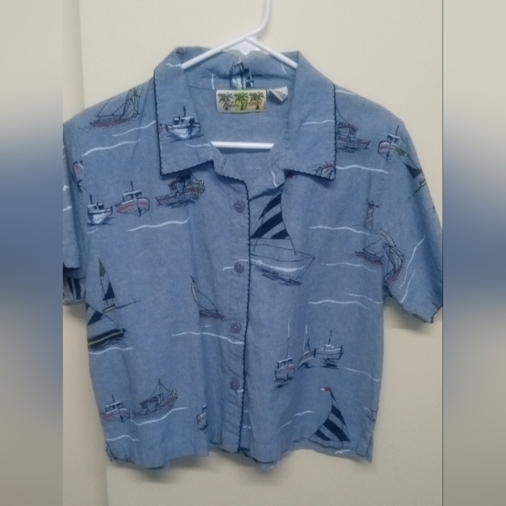 This Shirt is Absolutely Adorable for any Young Boy. Has Sailboat Designs